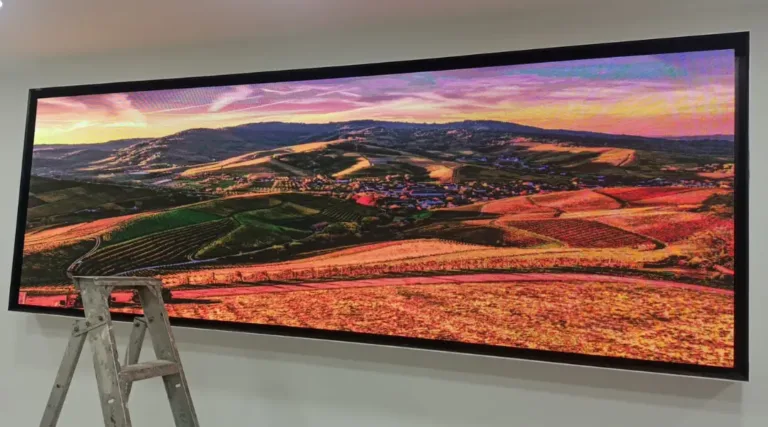 digital display screen mounted on the wall, showcasing vibrant colors