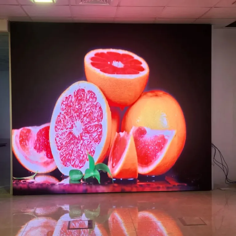 indoor LED screen displaying grapefruits arranged in an appealing manner.