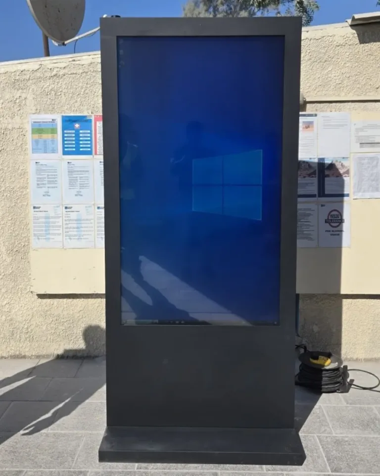 A big LCD screen featuring a bright blue screen
