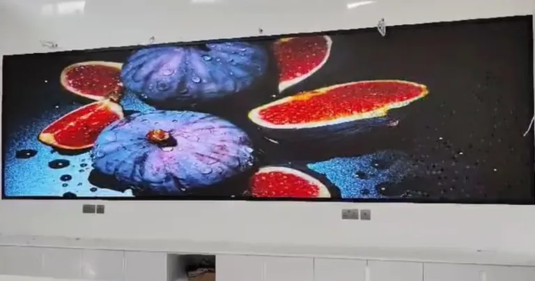 An LED wall displaying a vibrant colour fruit
