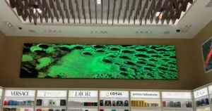 A store features a Custom LED displays, surrounded by shelves by LED display dubai.