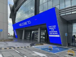 A large, colorful LED screen UAE showcasing a blue display with friendly lettering