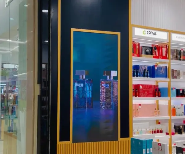 A perfume store, displaying an indoor LED wall screen for added visual appeal.