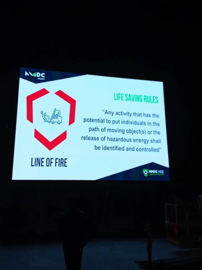 Large outdoor LED screen displaying a fire safety message for public awareness.