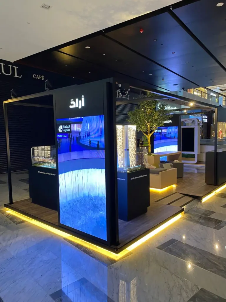 A large display highlighting an indoor screen displaying engaging content.