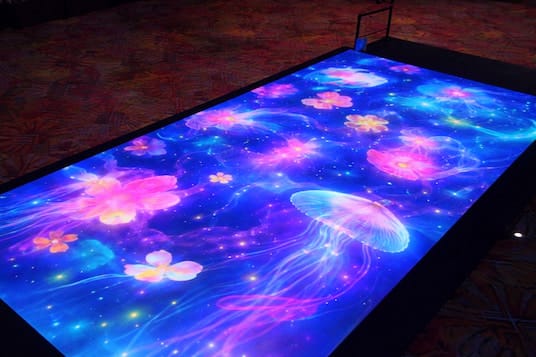 A vibrant LED dance floor illuminated with a colorful light show!