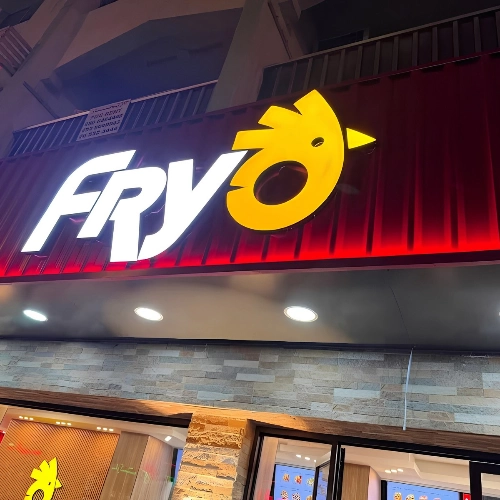 Fryo restaurant sign with illuminated 3D letters and chicken logo