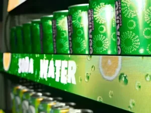 Electronic shelf display showing a soda water advertisement