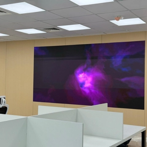 DGICON digital signage display screen in a modern corporate office workspace